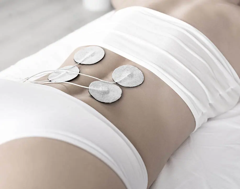 Patient receiving electrotherapy in London Ealing at PhysioB