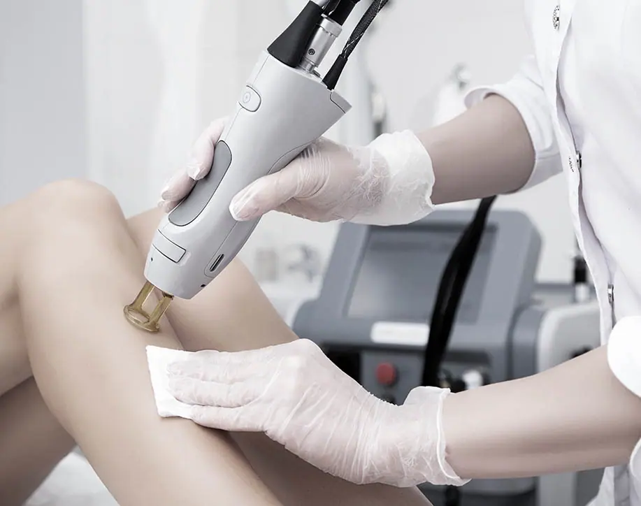 Patient receiving laser therapy at PhysioB in London Ealing