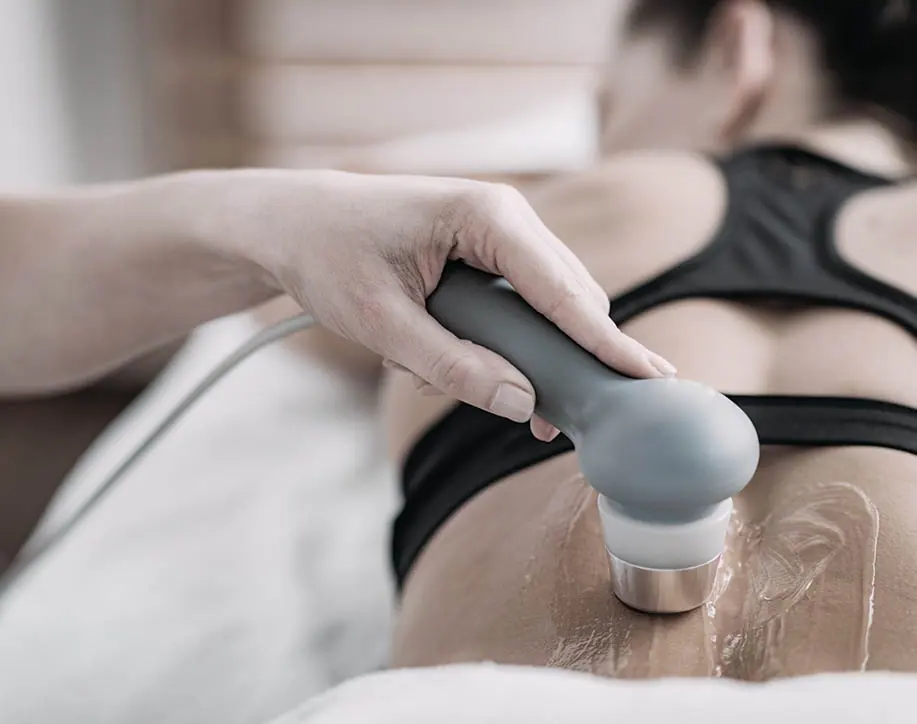 Patient receiving ultrasound therapy in London Ealing at PhysioB